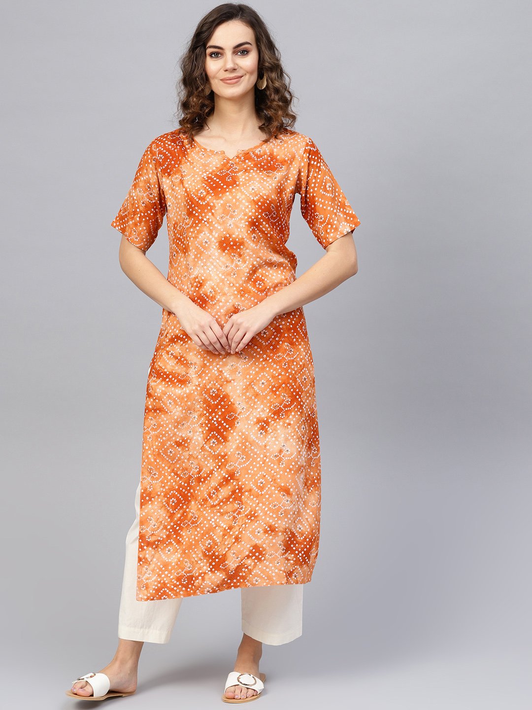 Women Rust Orange & White Bandhani Printed Straight Kurta | LASVINI - Redefining Indian Fashion with Elegance