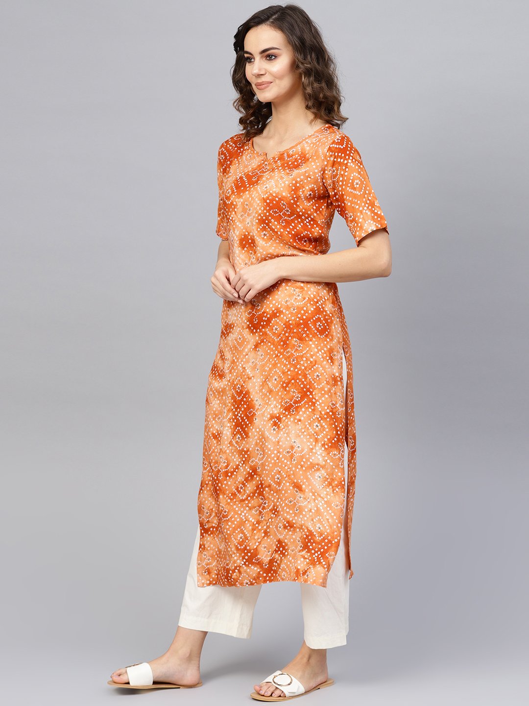Women Rust Orange & White Bandhani Printed Straight Kurta | LASVINI - Redefining Indian Fashion with Elegance