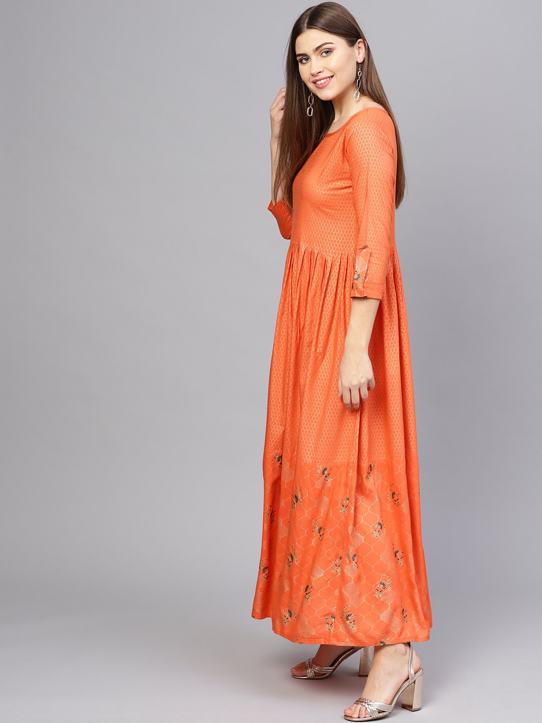 Women Orange & Golden Printed Maxi Dress | LASVINI - Redefining Indian Fashion with Elegance