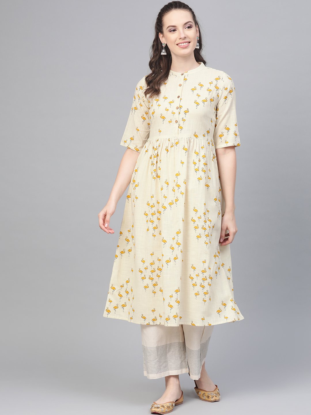 Off White And Yellow Ochre Flamingo Printed Dress With A Detachable Belt Detailing On The Yoke | LASVINI - Redefining Indian Fashion with Elegance