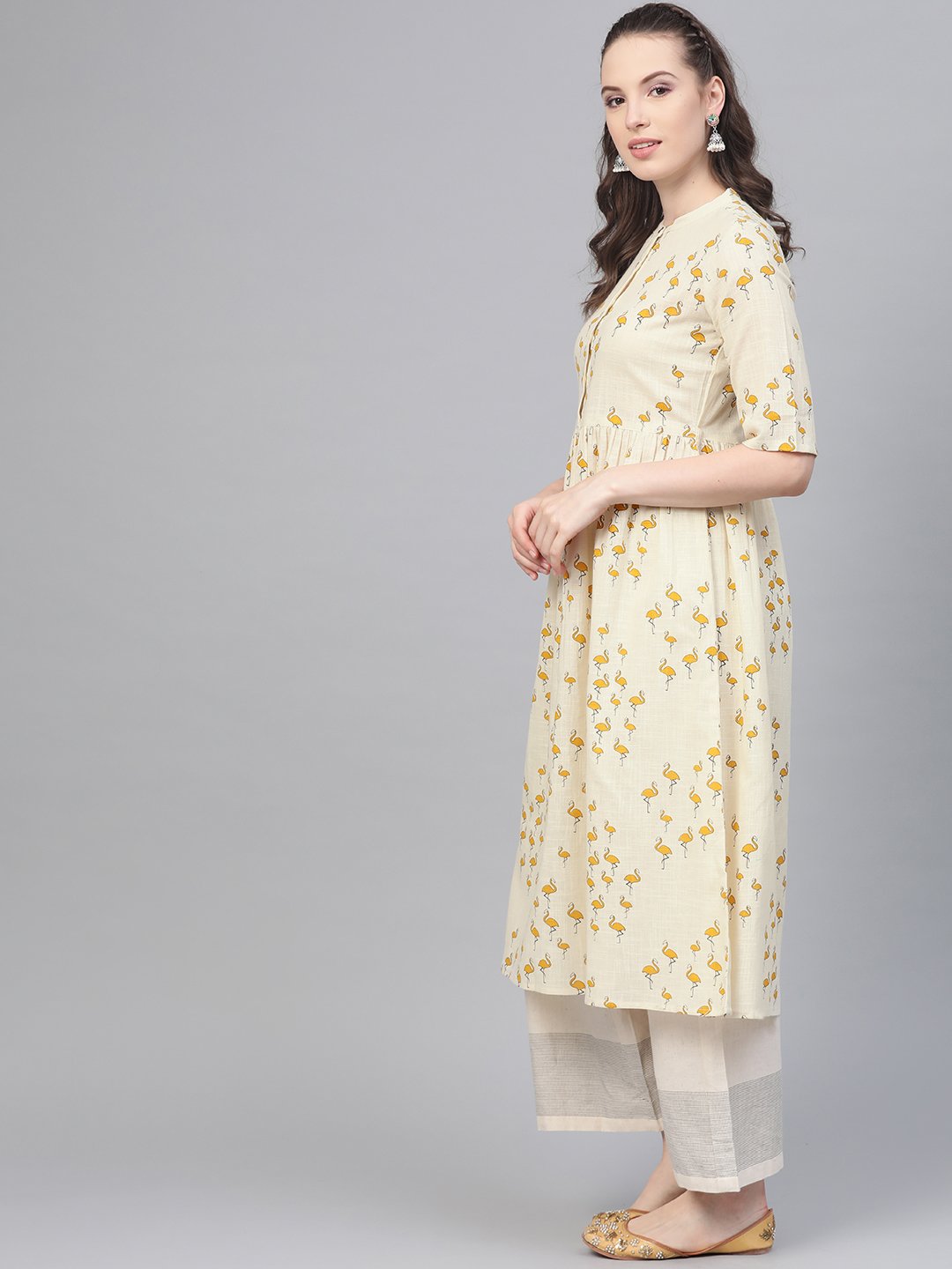 Off White And Yellow Ochre Flamingo Printed Dress With A Detachable Belt Detailing On The Yoke | LASVINI - Redefining Indian Fashion with Elegance