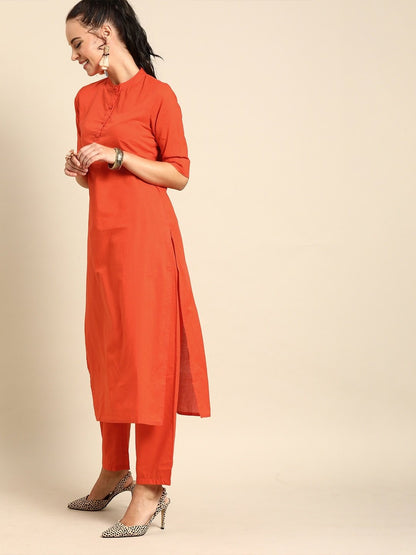 Women Orange Solid Kurta With Trousers & Dupatta | LASVINI - Redefining Indian Fashion with Elegance