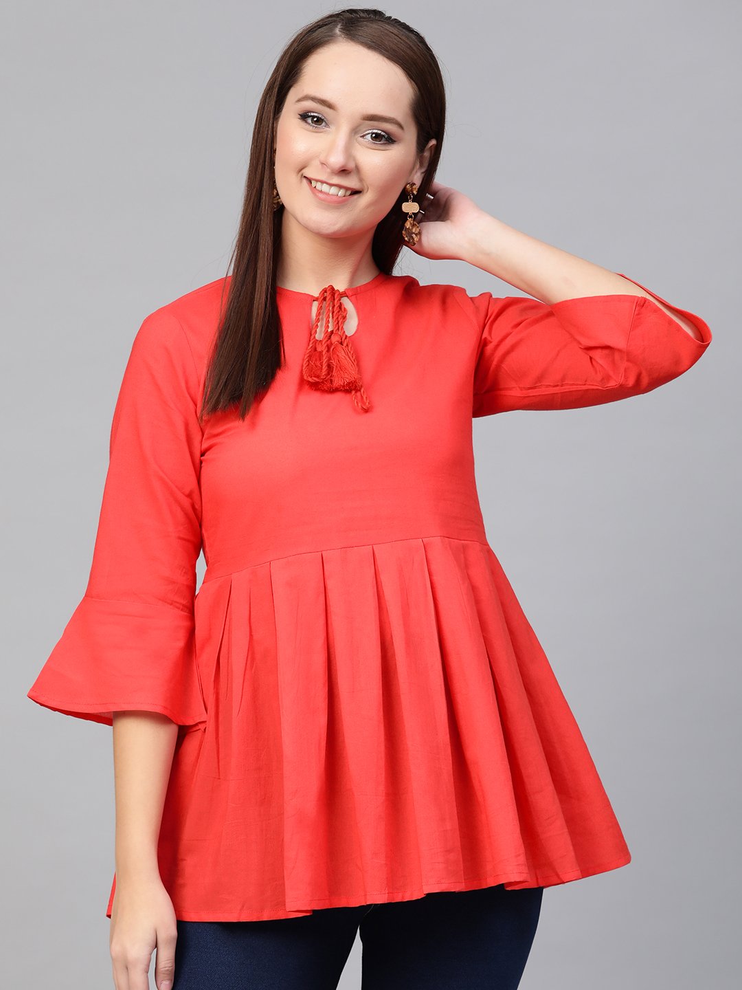 Women Red Solid Tie-Up Neck Peplum Top | LASVINI - Redefining Indian Fashion with Elegance