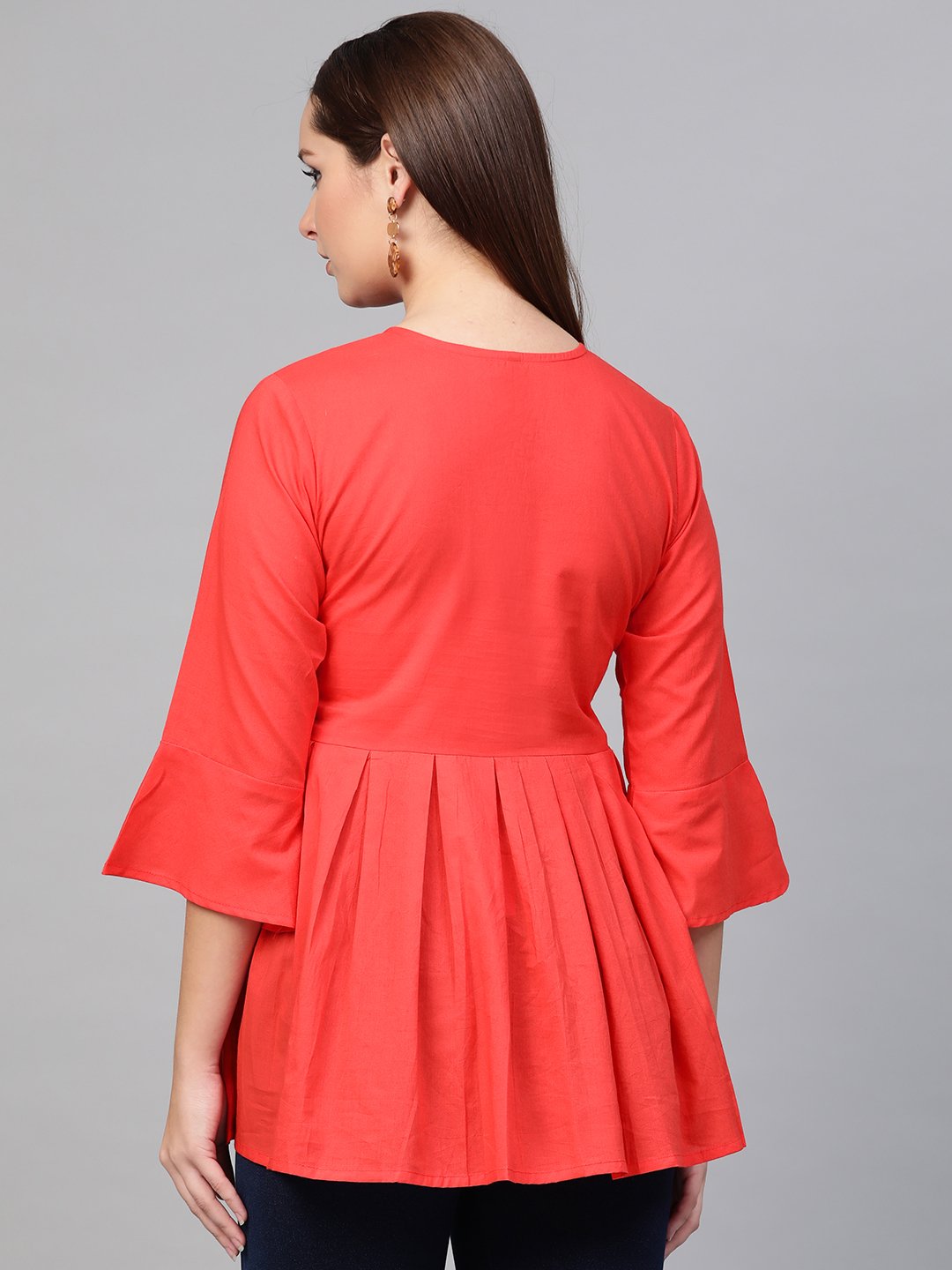 Women Red Solid Tie-Up Neck Peplum Top | LASVINI - Redefining Indian Fashion with Elegance