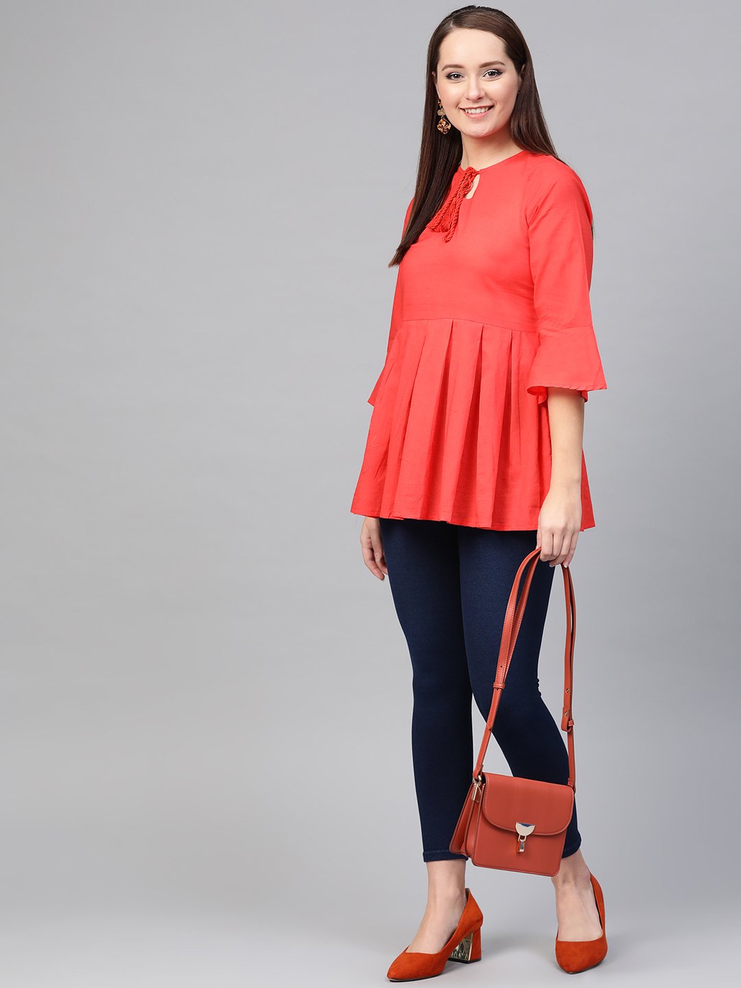 Women Red Solid Tie-Up Neck Peplum Top | LASVINI - Redefining Indian Fashion with Elegance