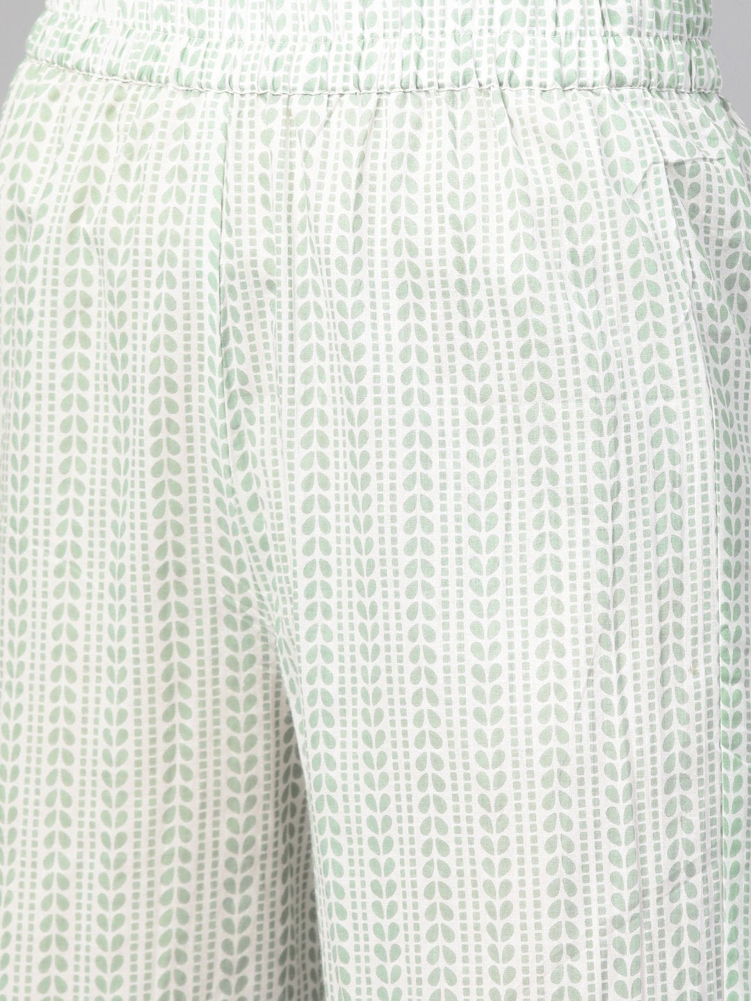 Women Green & Beige Straight Quirky Printed Kurta And Trousers Set | LASVINI - Redefining Indian Fashion with Elegance