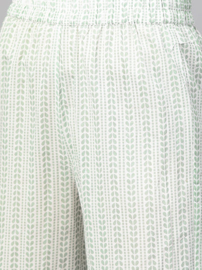 Women Green & Beige Straight Quirky Printed Kurta And Trousers Set | LASVINI - Redefining Indian Fashion with Elegance