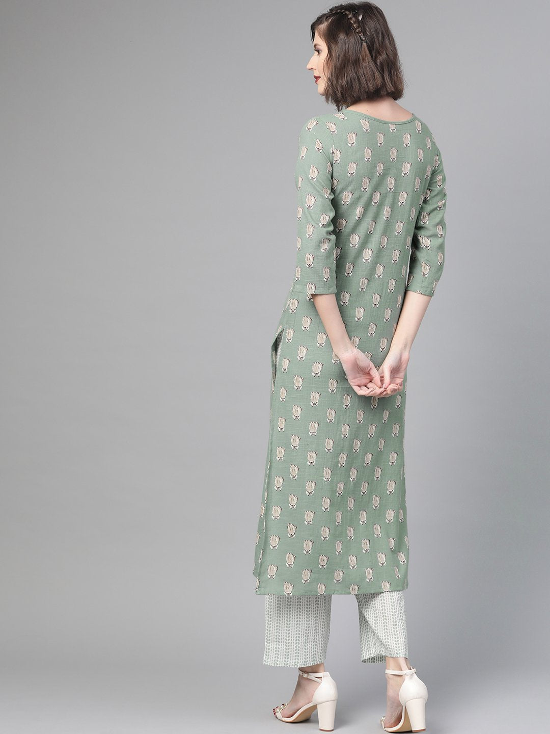 Women Green & Beige Straight Quirky Printed Kurta And Trousers Set | LASVINI - Redefining Indian Fashion with Elegance