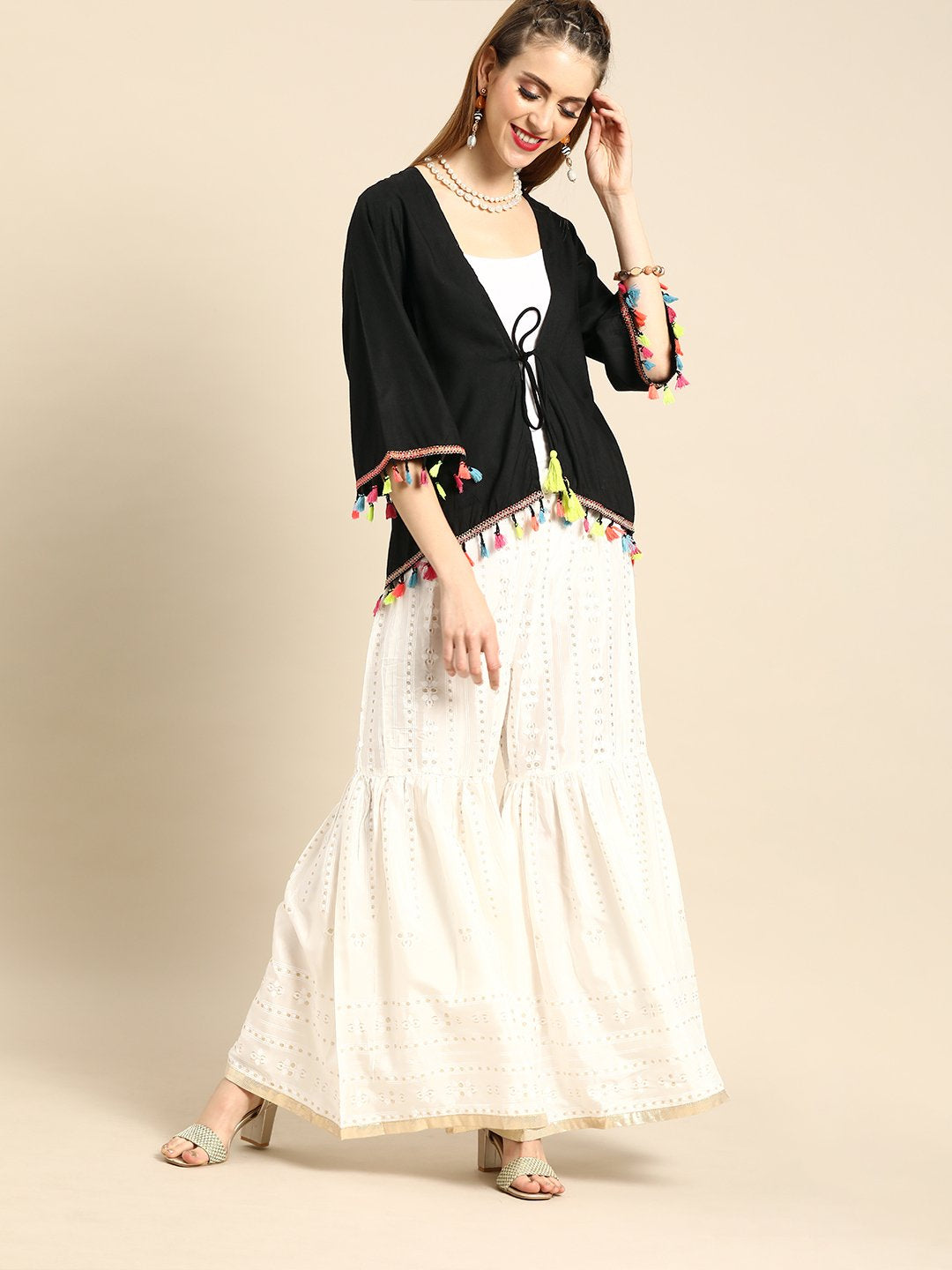 Women Solid Black Shrug With Tassle And Pom Pom Detail | LASVINI - Redefining Indian Fashion with Elegance