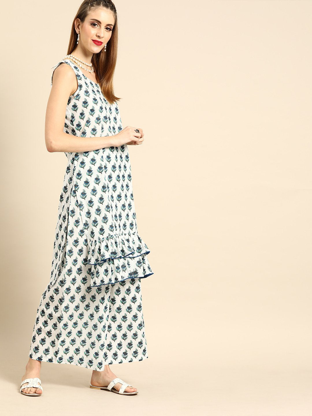 Women White Sleeveless Flared Ruffle Kurta With Palazzo | LASVINI - Redefining Indian Fashion with Elegance