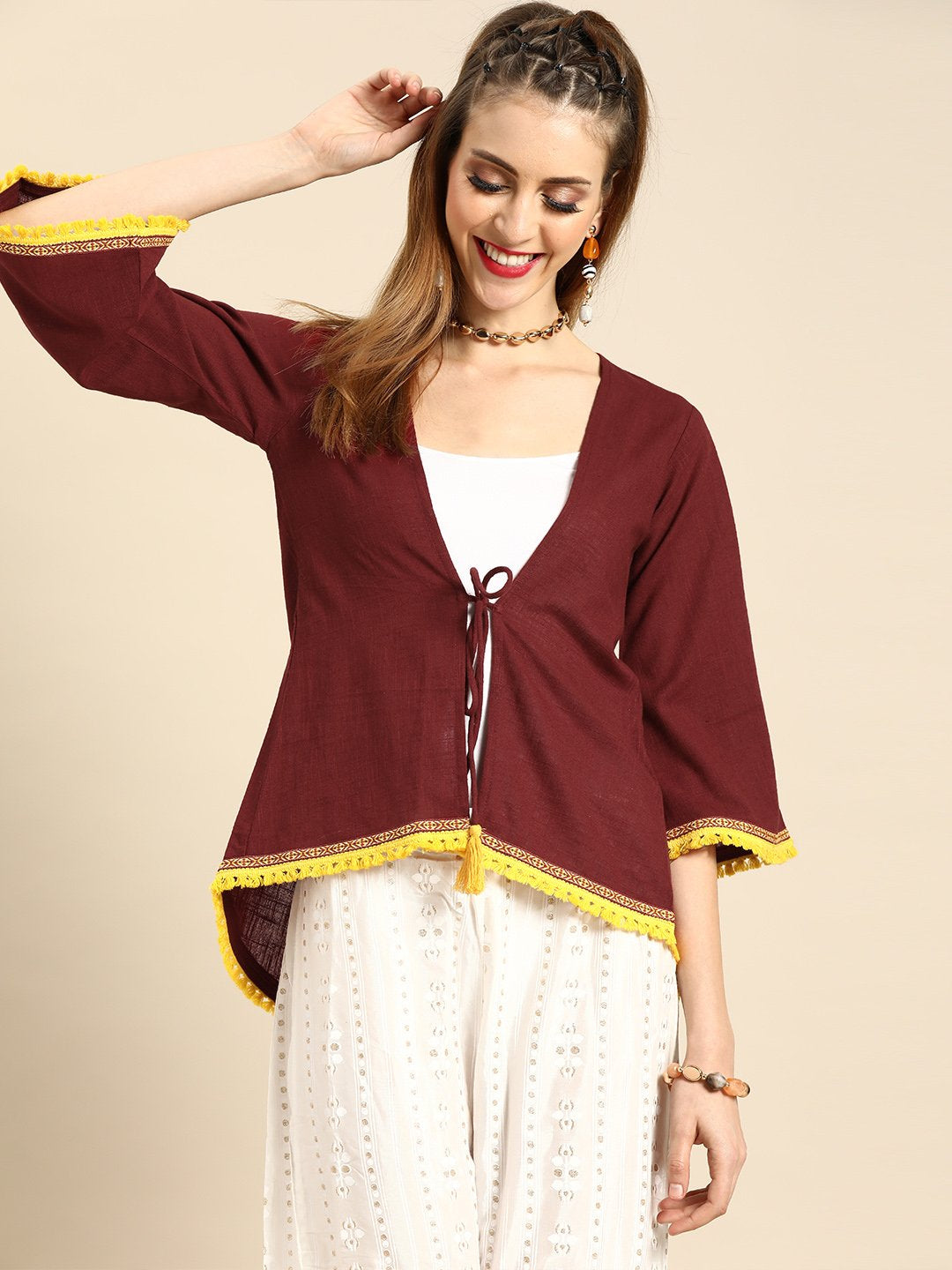 Women Solid Maroon Shrug With Tassle And Lace Detail | LASVINI - Redefining Indian Fashion with Elegance