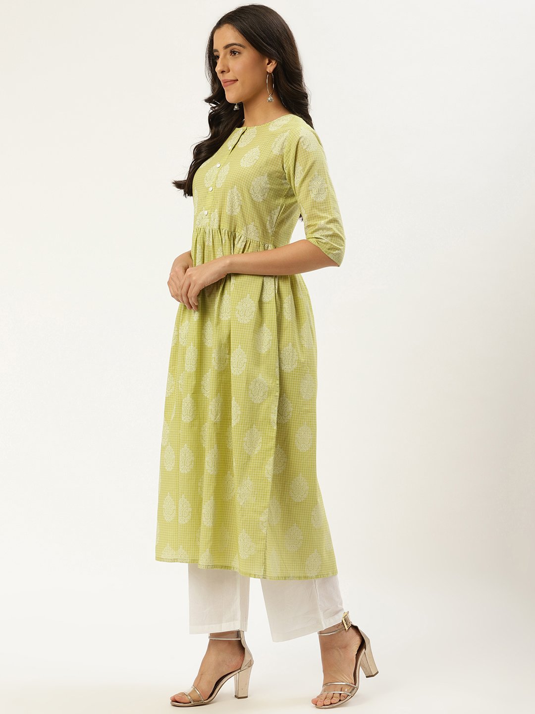 Women Pista Green Three-Quarter Sleeves Flared Kurta And Palazzo Set | LASVINI - Redefining Indian Fashion with Elegance