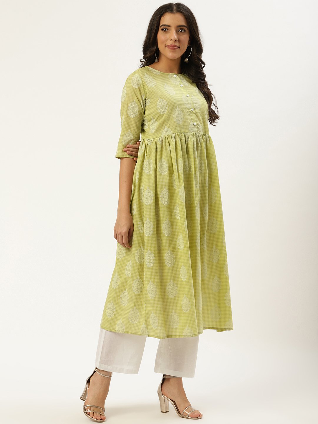 Women Pista Green Three-Quarter Sleeves Flared Kurta And Palazzo Set | LASVINI - Redefining Indian Fashion with Elegance