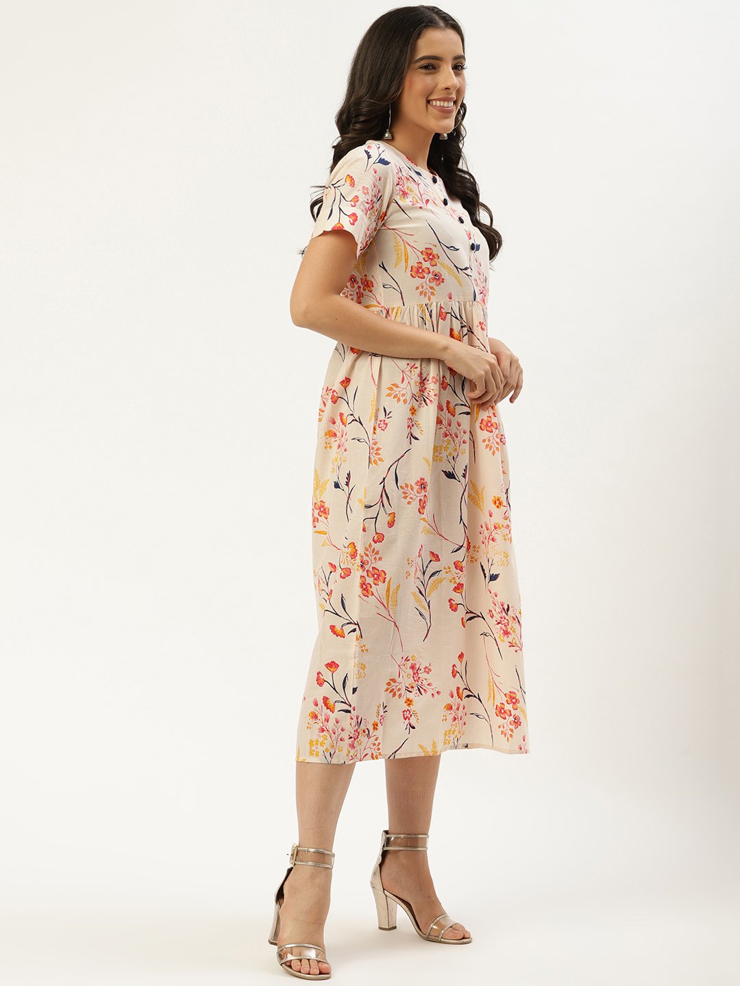 Women Yellow Floral Printed Round Neck Cotton A-Line Dress | LASVINI - Redefining Indian Fashion with Elegance