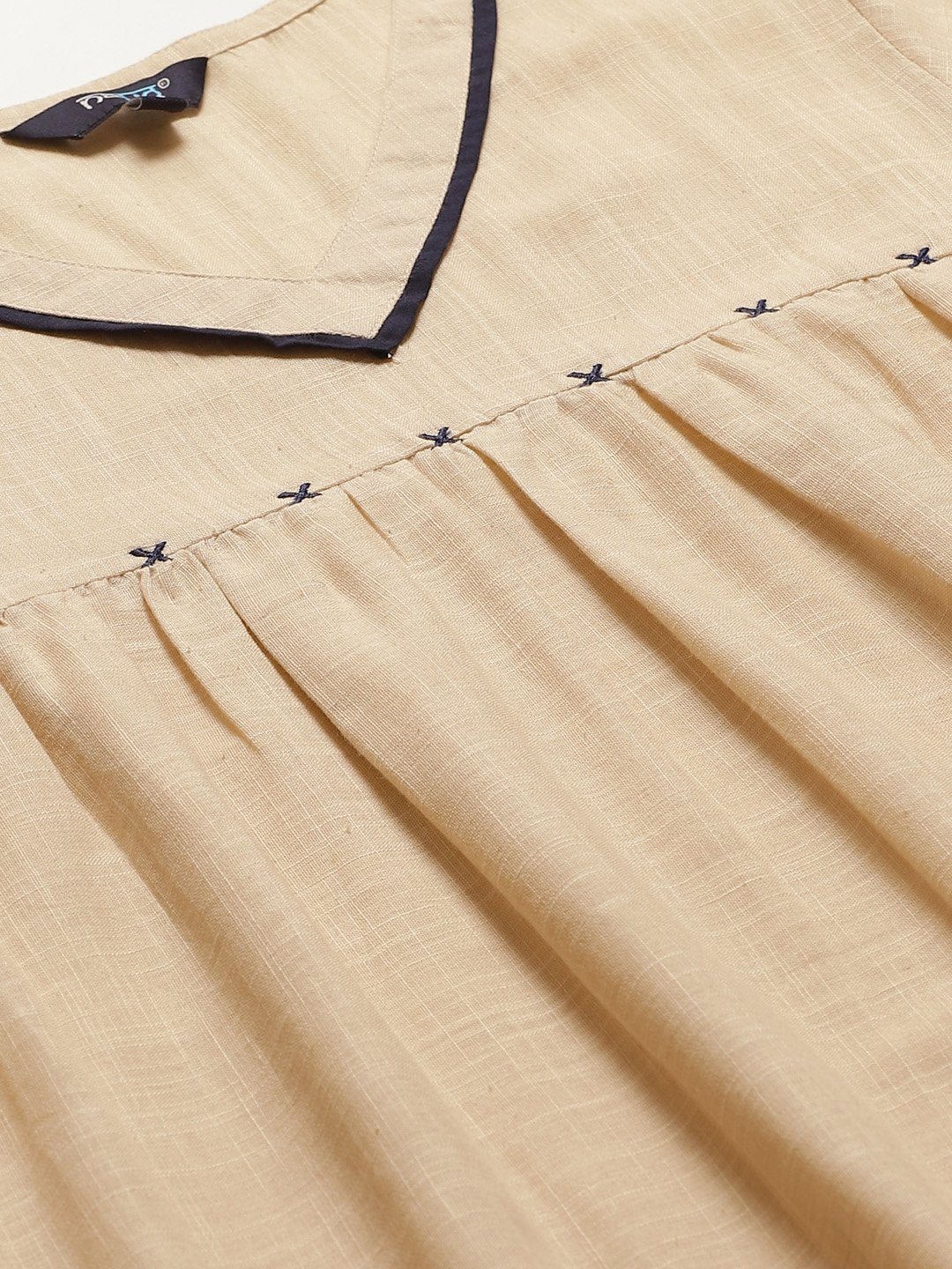 Women Beige Solid Solid V-Neck Cotton A-Line Dress | LASVINI - Redefining Indian Fashion with Elegance
