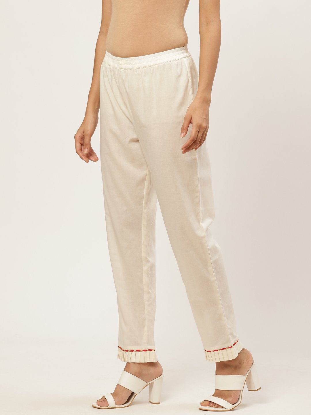 Women Off White Solid Trouser | LASVINI - Redefining Indian Fashion with Elegance
