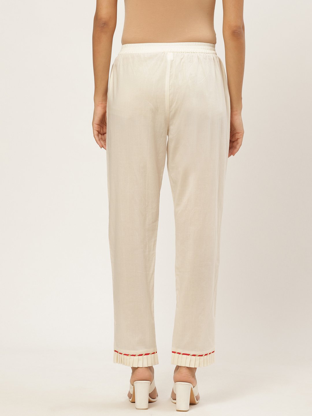 Women Off White Solid Trouser | LASVINI - Redefining Indian Fashion with Elegance