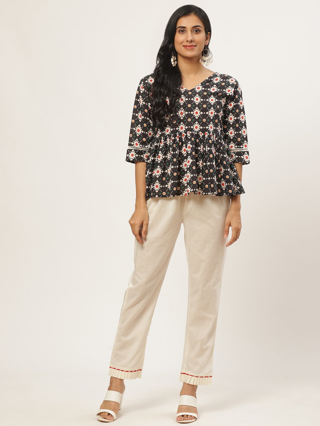 Women Off White Solid Trouser | LASVINI - Redefining Indian Fashion with Elegance