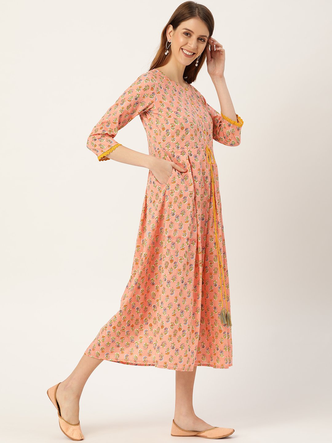 Women Peach Ethnic Motifs Printed Round Neck Cotton Maxi Dress | LASVINI - Redefining Indian Fashion with Elegance