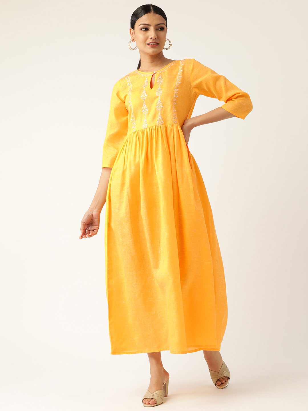 Women Yellow Solid Solid Keyhole Neck Cotton Fit And Flare Dress | LASVINI - Redefining Indian Fashion with Elegance