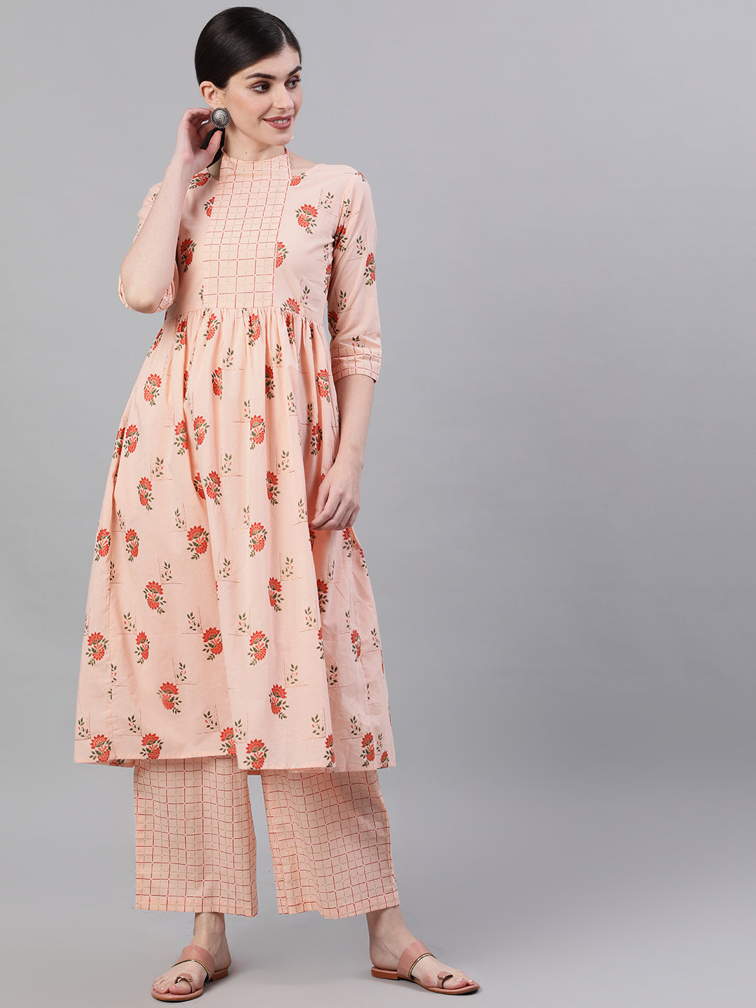 Women Peach Three-Quarter Sleeves Flared Kurta With Palazzo | LASVINI - Redefining Indian Fashion with Elegance