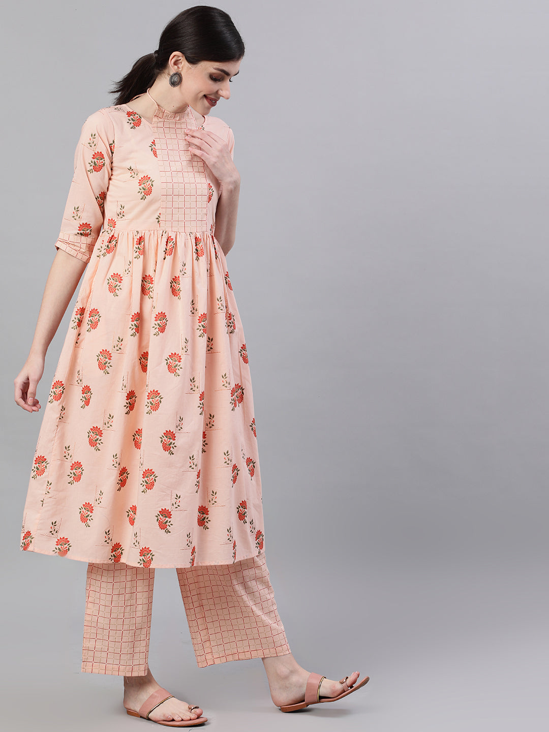 Women Peach Three-Quarter Sleeves Flared Kurta With Palazzo | LASVINI - Redefining Indian Fashion with Elegance