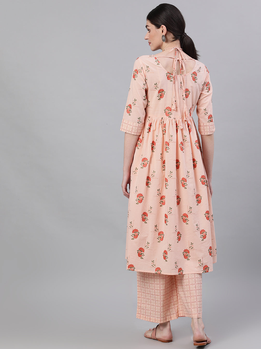 Women Peach Three-Quarter Sleeves Flared Kurta With Palazzo | LASVINI - Redefining Indian Fashion with Elegance