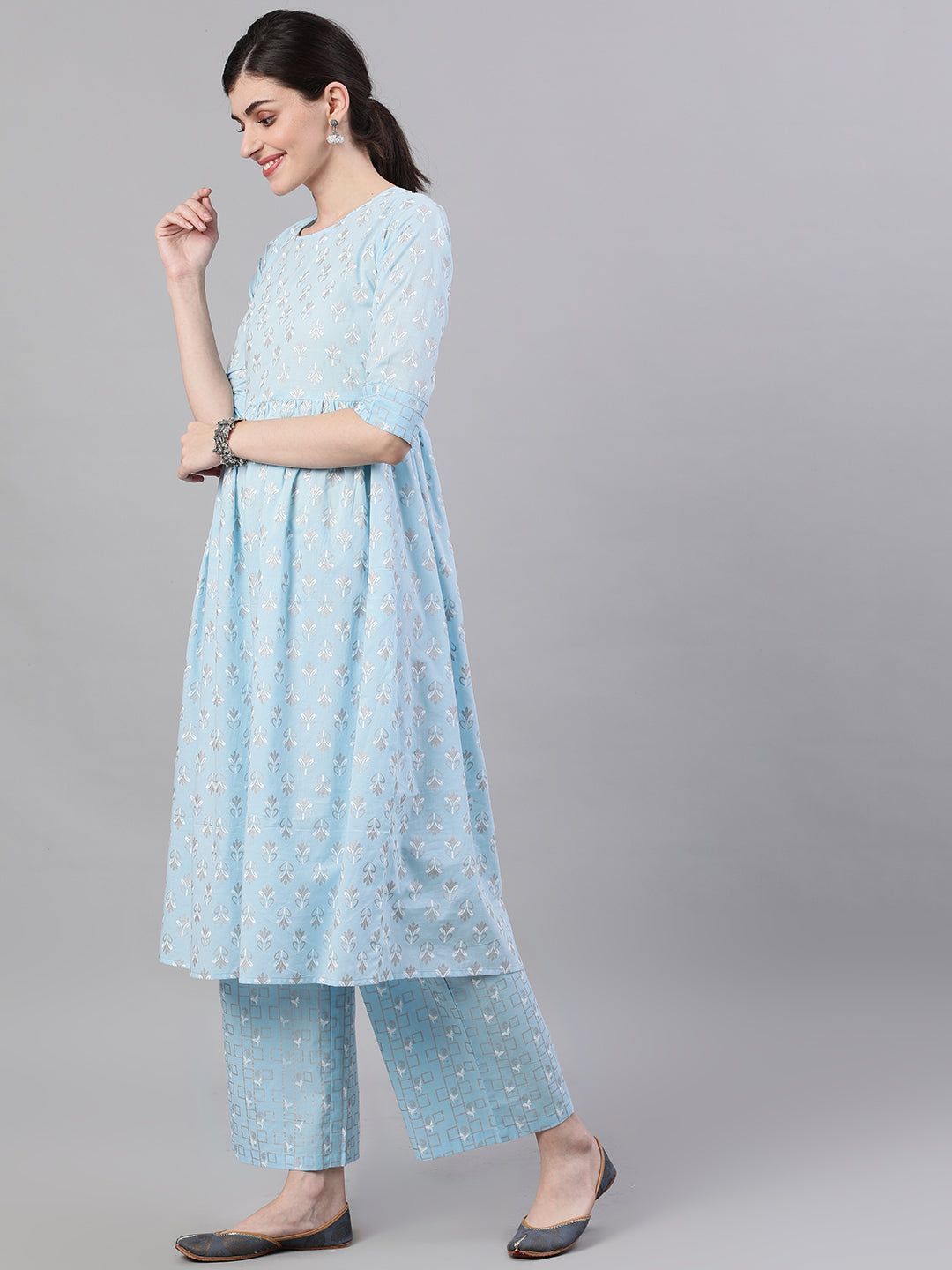 Women Pastel Sky Blue Three-Quarter Sleeves Flared Kurta And Palazzo Set | LASVINI - Redefining Indian Fashion with Elegance