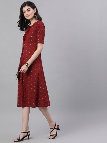 Women Maroon Polka Dots Printed Tie-Up Neck Polyester A-Line Dress | LASVINI - Redefining Indian Fashion with Elegance
