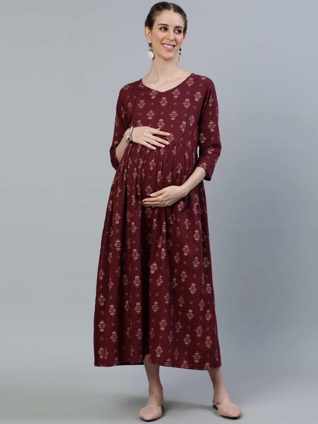Women Maroon Printed Flared Maternity Dress With Three Quarters Sleeves & Belt | LASVINI - Redefining Indian Fashion with Elegance