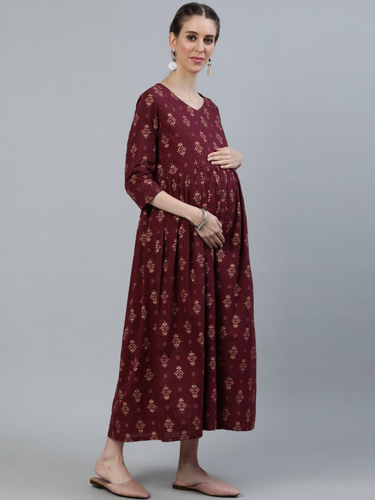 Women Maroon Printed Flared Maternity Dress With Three Quarters Sleeves & Belt | LASVINI - Redefining Indian Fashion with Elegance
