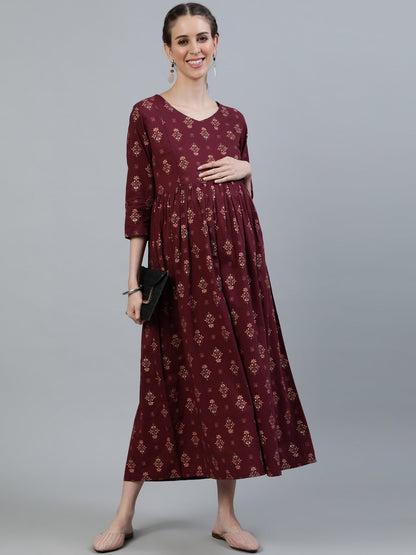 Women Maroon Printed Flared Maternity Dress With Three Quarters Sleeves & Belt | LASVINI - Redefining Indian Fashion with Elegance