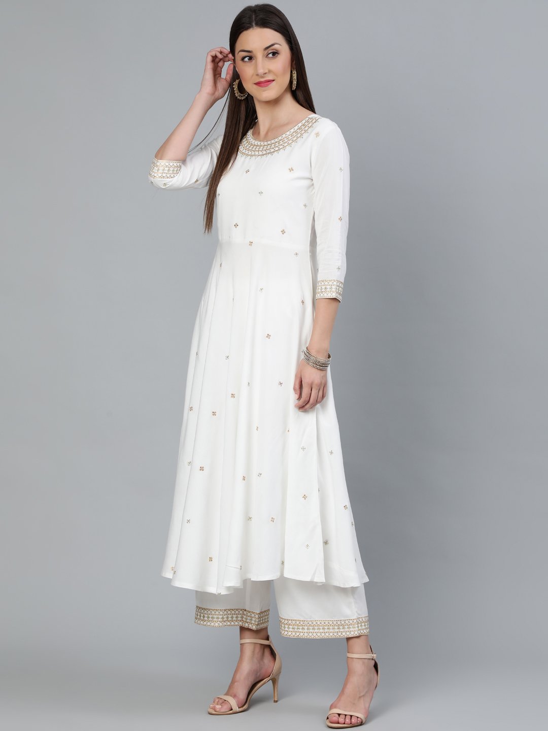 Women Off-White Gold Embroidered Flared Kurta Plazzo With Net Dupatta | LASVINI - Redefining Indian Fashion with Elegance