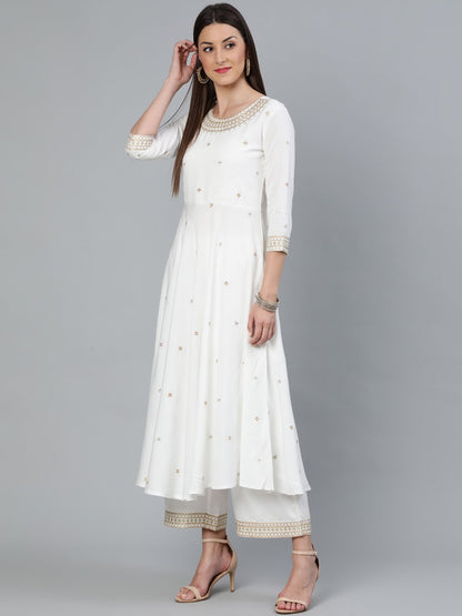 Women Off-White Gold Embroidered Flared Kurta Plazzo With Net Dupatta | LASVINI - Redefining Indian Fashion with Elegance