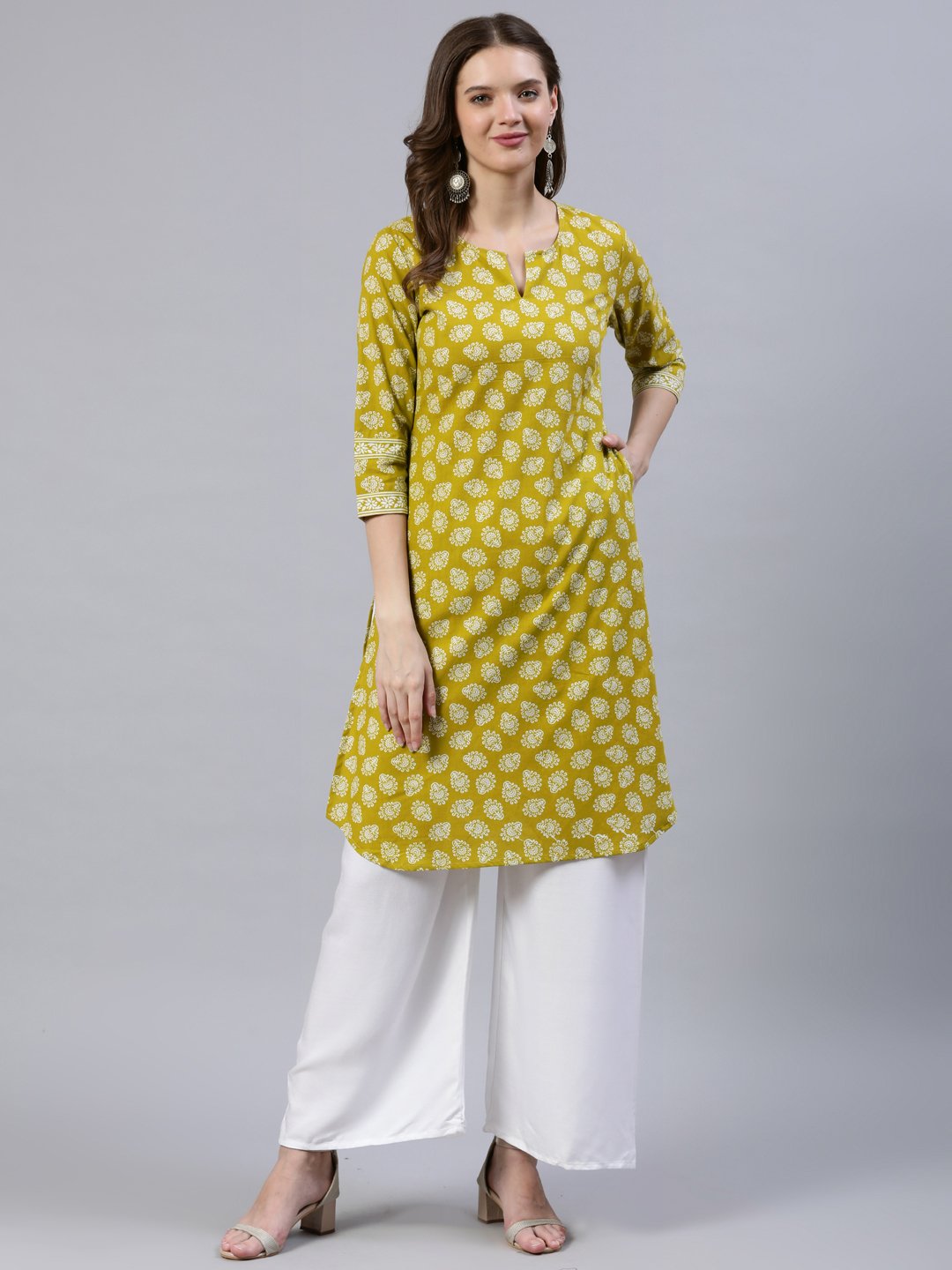 Women Green Printed Straight Kurta With Three Quarter Sleeves | LASVINI - Redefining Indian Fashion with Elegance