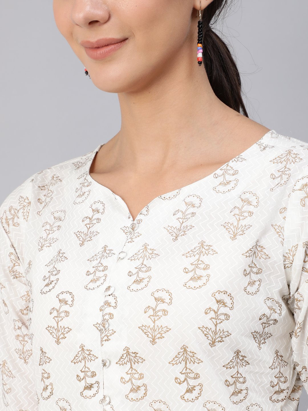 Women Off-White & Gold Printed Tunic With Three Quarter Sleeves | LASVINI - Redefining Indian Fashion with Elegance