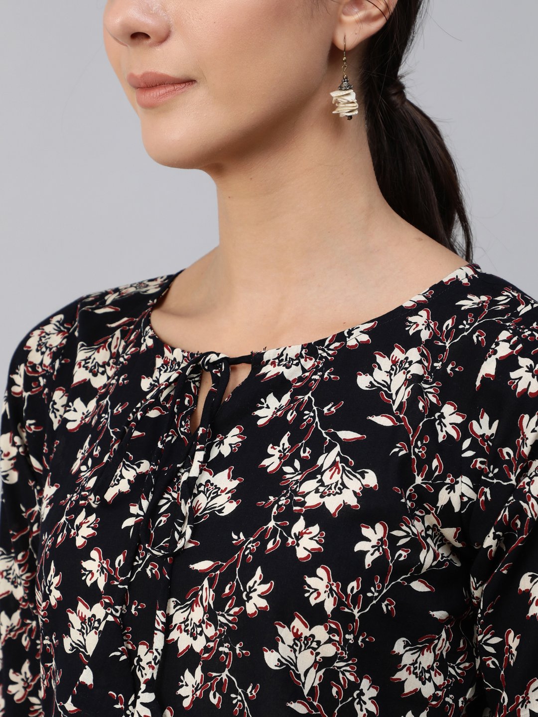 Women Black Floral Printed Top With Three Quarter Flared Sleeves | LASVINI - Redefining Indian Fashion with Elegance