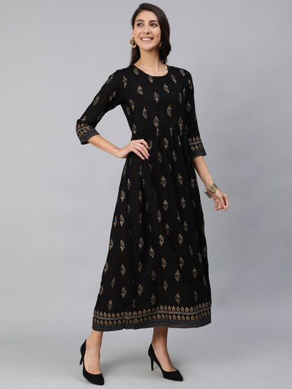 Women Black & Gold Printed Maxi Dress With Three Quarter Sleeves | LASVINI - Redefining Indian Fashion with Elegance
