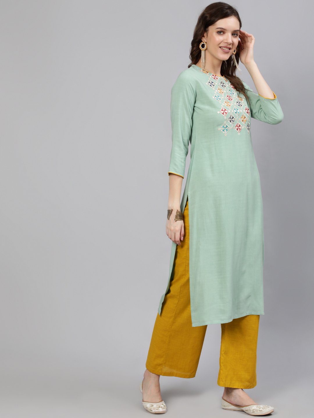 Women Green Embroidered Straight Kurta With Three Quarter Sleeves | LASVINI - Redefining Indian Fashion with Elegance