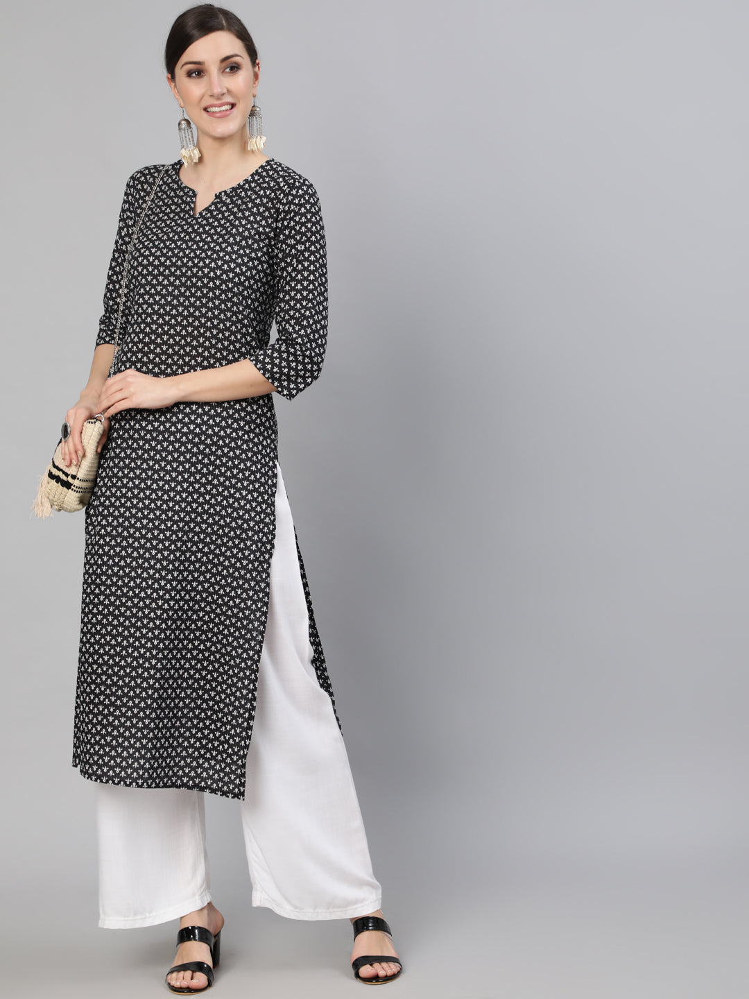 Women Black Abstrac Printed Straight Kurta With Three Quarter Sleeves | LASVINI - Redefining Indian Fashion with Elegance