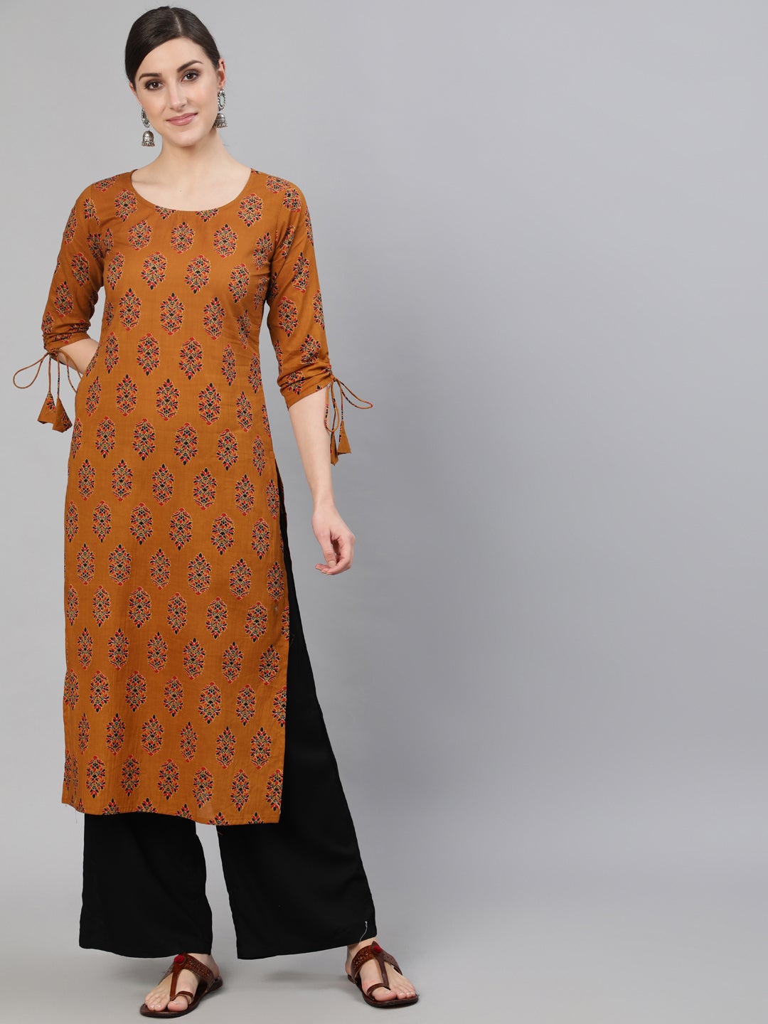 Women Mustard Ethnic Motifs Printed Straight Kurta With Tassel Detail | LASVINI - Redefining Indian Fashion with Elegance