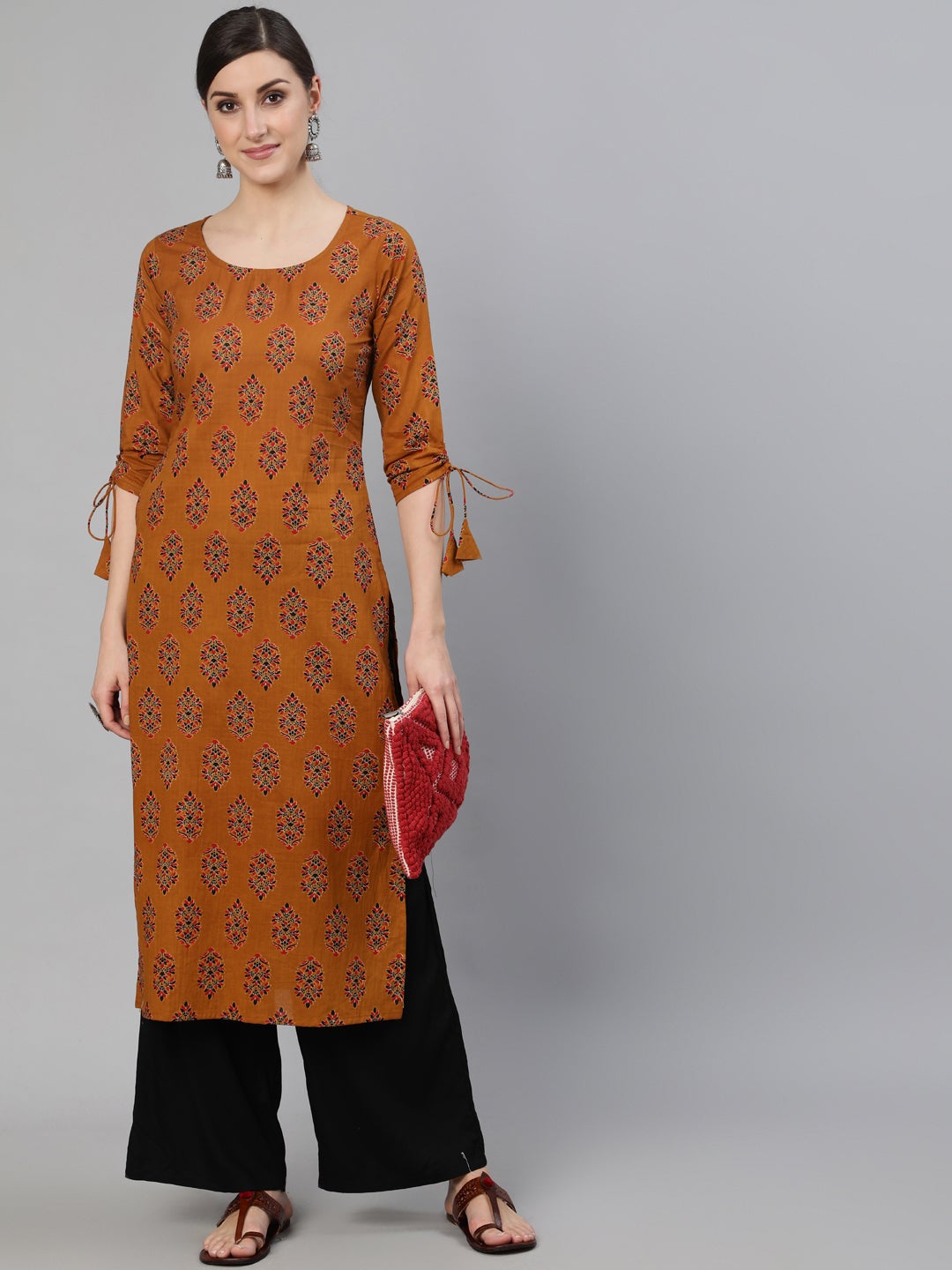 Women Mustard Ethnic Motifs Printed Straight Kurta With Tassel Detail | LASVINI - Redefining Indian Fashion with Elegance