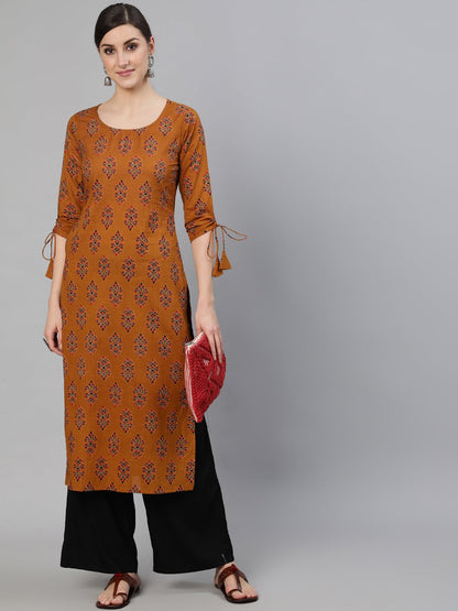 Women Mustard Ethnic Motifs Printed Straight Kurta With Tassel Detail | LASVINI - Redefining Indian Fashion with Elegance