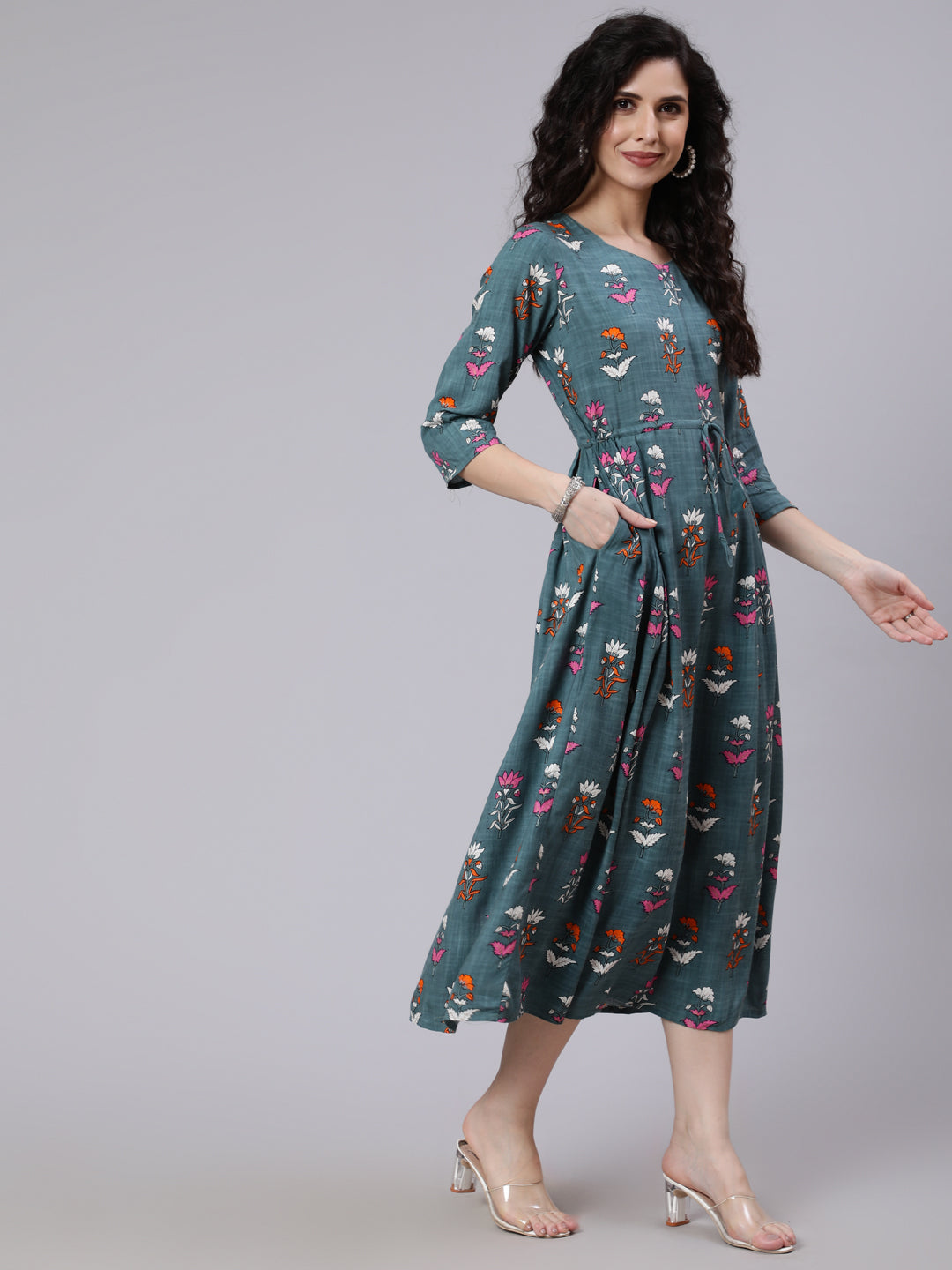 Women Green Floral Printed Flared Dress With Three Quarter Sleeeves | LASVINI - Redefining Indian Fashion with Elegance