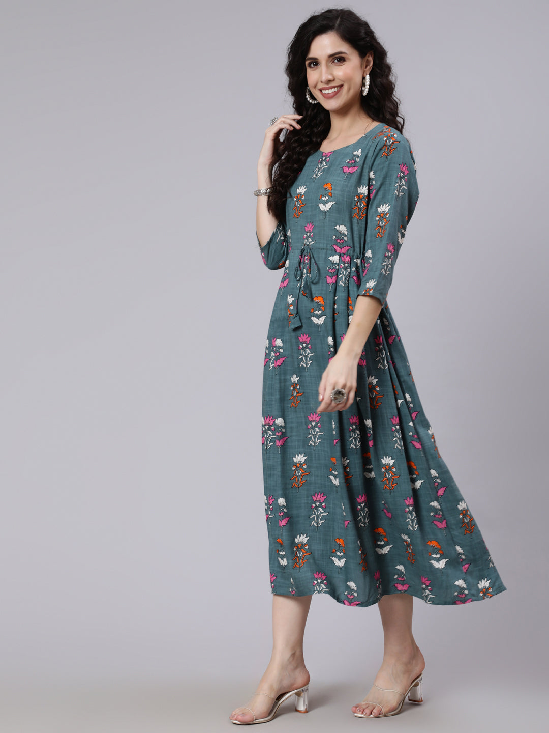 Women Green Floral Printed Flared Dress With Three Quarter Sleeeves | LASVINI - Redefining Indian Fashion with Elegance