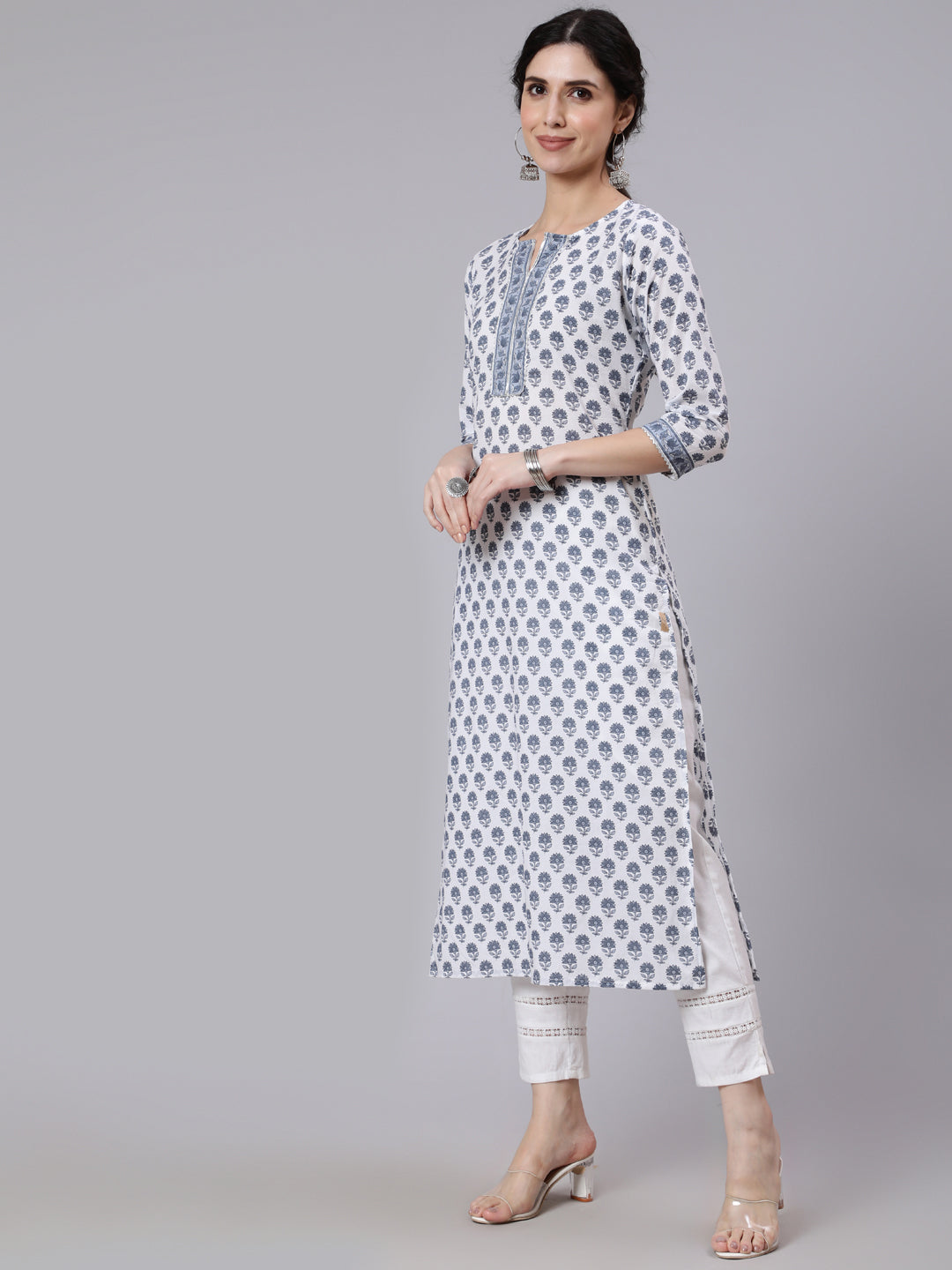 Women Off-White Printed Straight Kurta With Three Quarter Sleeves | LASVINI - Redefining Indian Fashion with Elegance