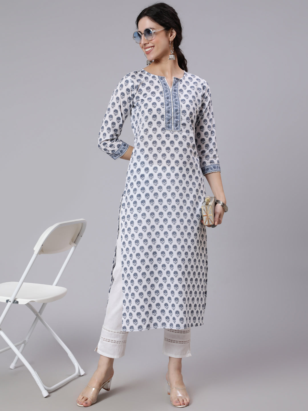 Women Off-White Printed Straight Kurta With Three Quarter Sleeves | LASVINI - Redefining Indian Fashion with Elegance