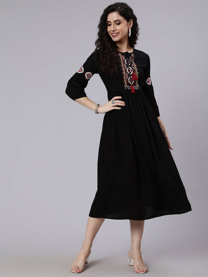Women Black Solid Embroidered Yoke Design Dress | LASVINI - Redefining Indian Fashion with Elegance