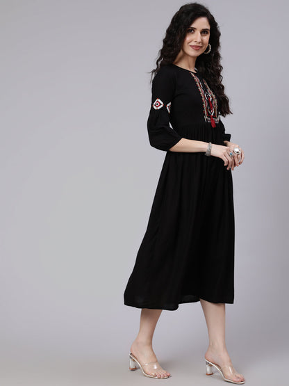 Women Black Solid Embroidered Yoke Design Dress | LASVINI - Redefining Indian Fashion with Elegance