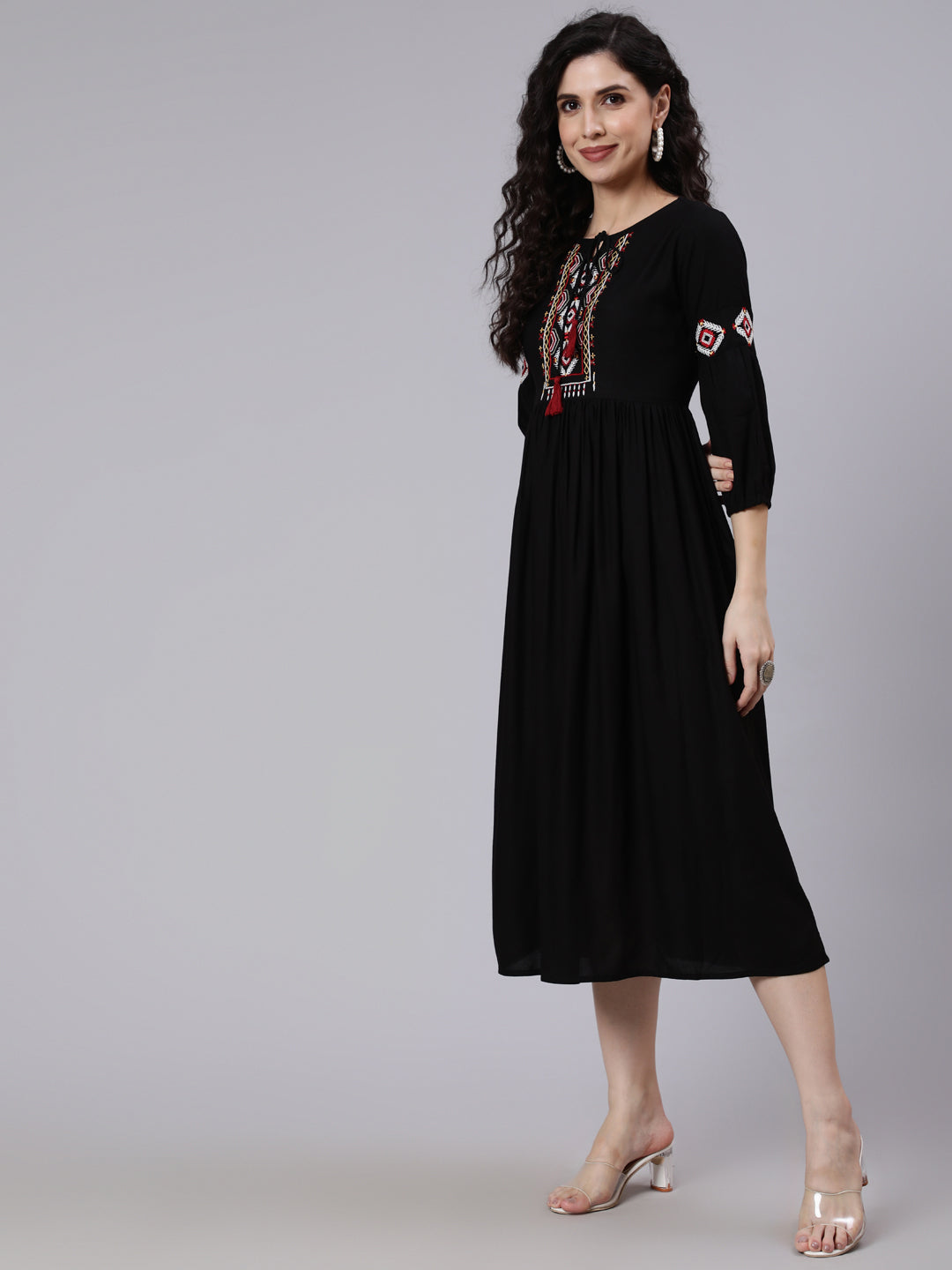 Women Black Solid Embroidered Yoke Design Dress | LASVINI - Redefining Indian Fashion with Elegance
